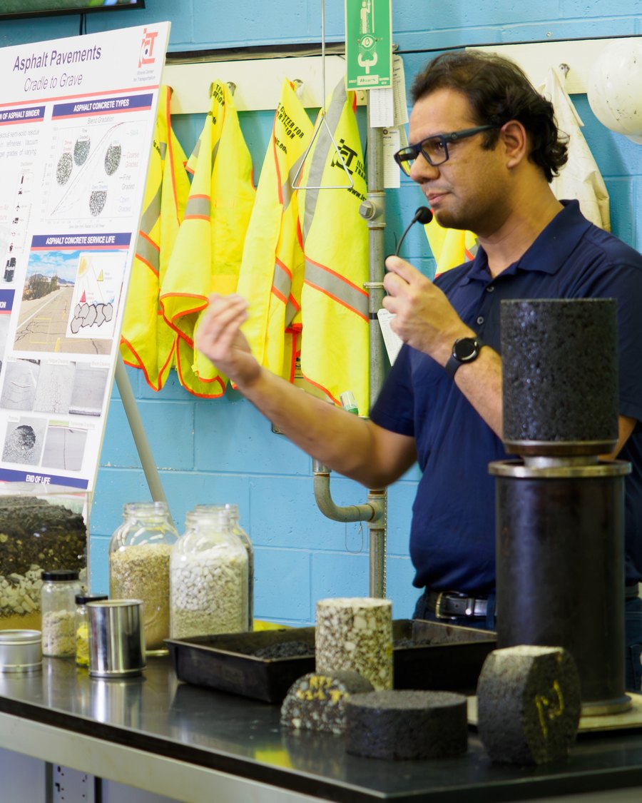 Akash Bajaj presenting asphalt pavement specimens at the Illinois Center for Transportation
